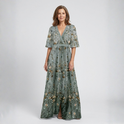 Melodi – Longue robe fleurie à col en V