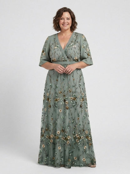 Melodi – Longue robe fleurie à col en V