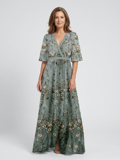 Melodi – Longue robe fleurie à col en V